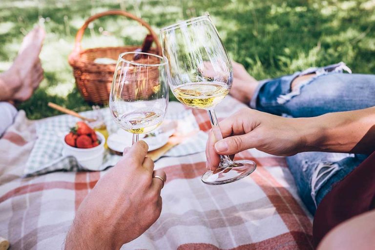 couple toasting with white wine