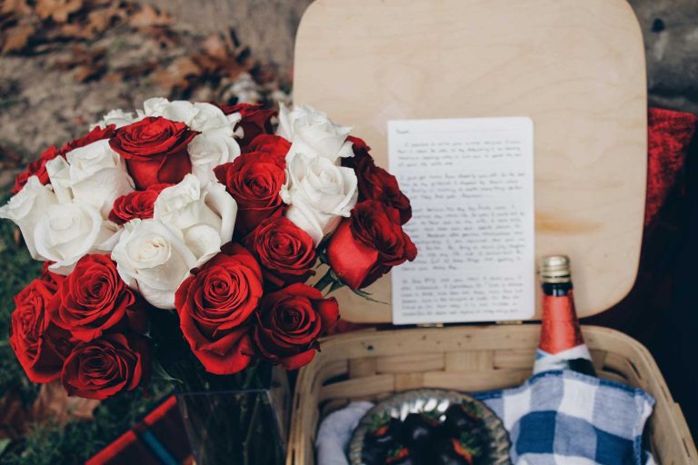 roses and love letter in a basket