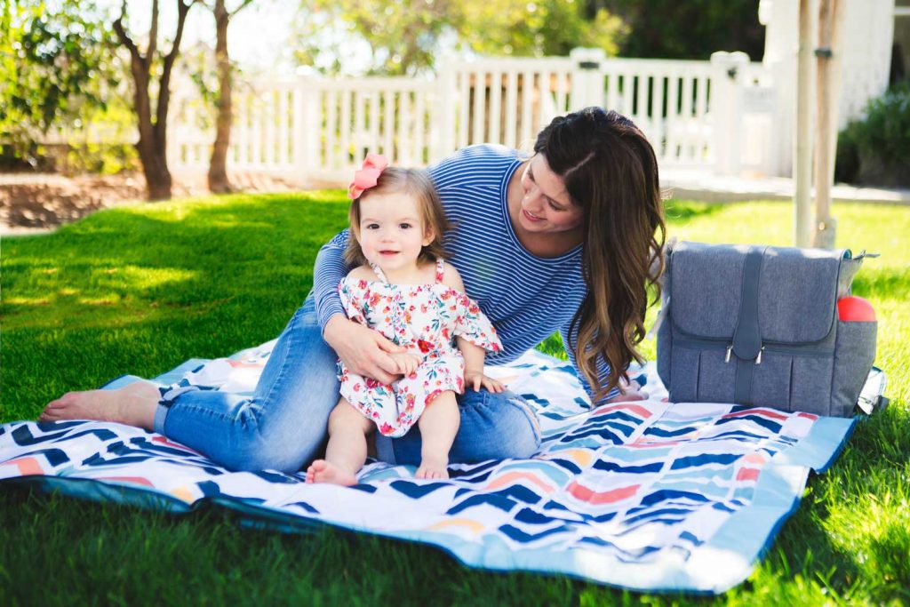 outdoor baby blanket mom and little girl