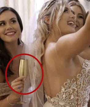 girl holding gold champagne glasses vonshef