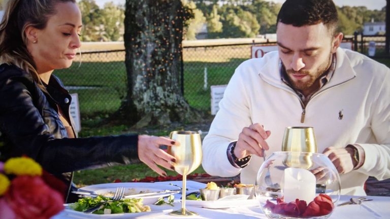 gold wine glasses on picnic table