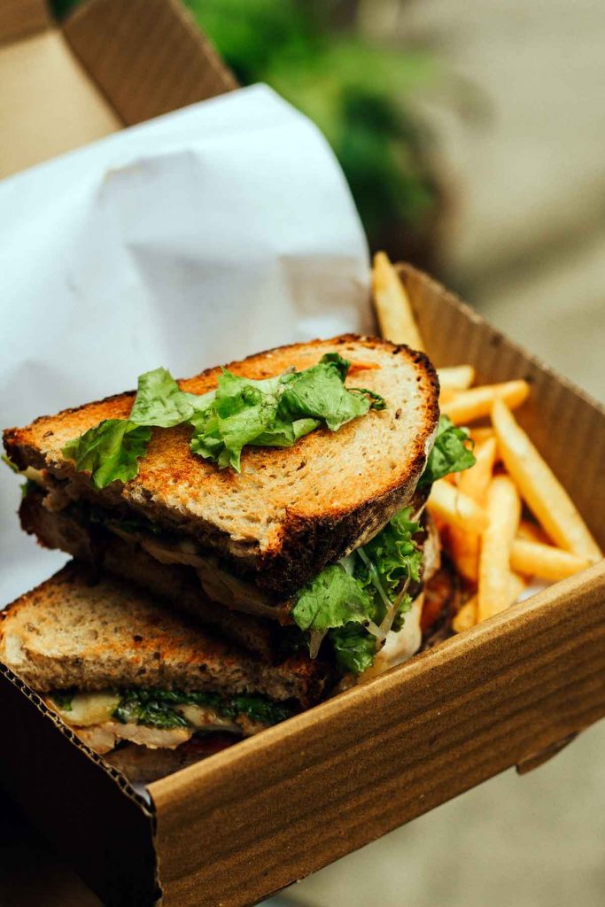 toasted bread sandwich with fries