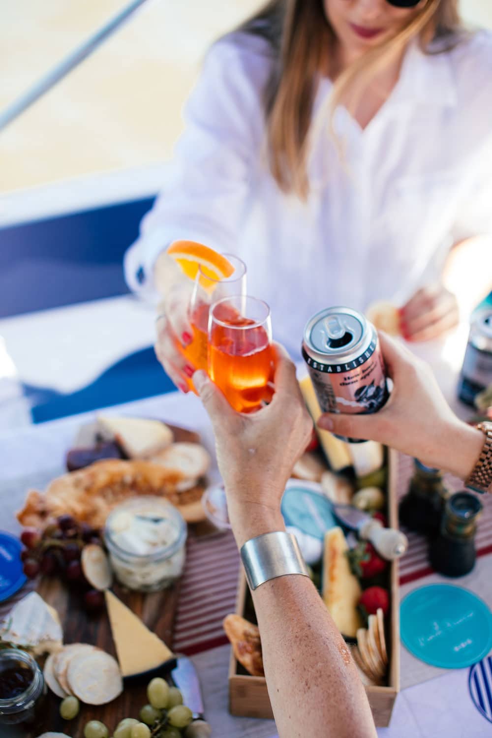 people drinking cocktails on yacht