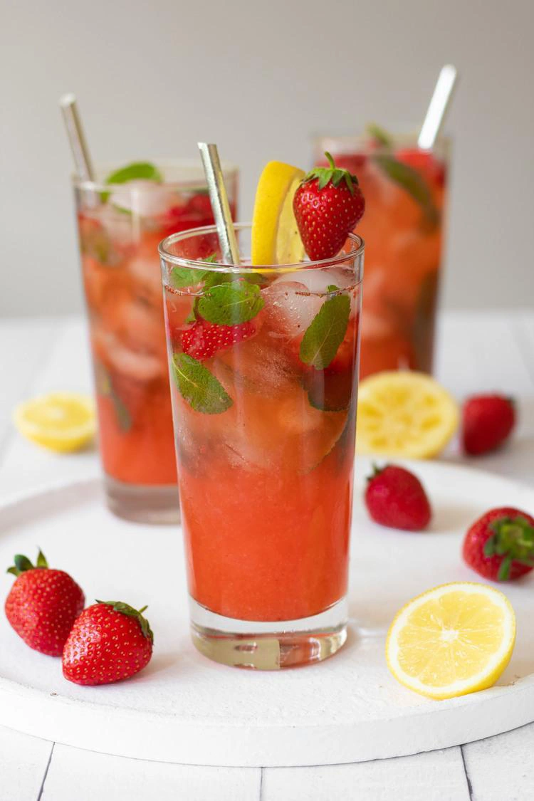 strawberry lemonade in glasses with mint