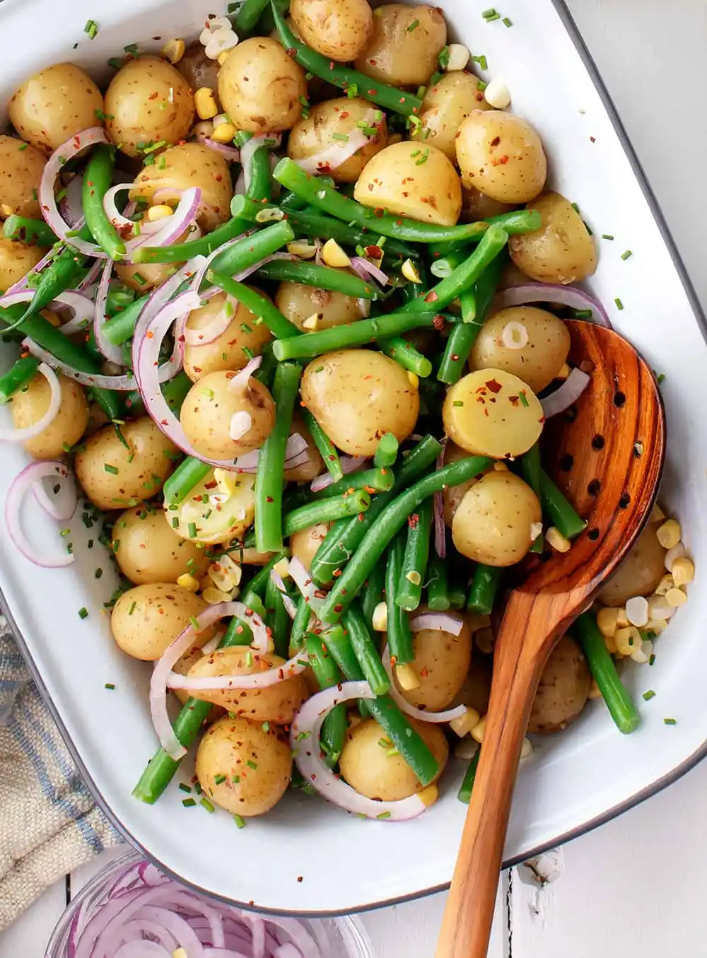 vegan potato salad with beans and onion