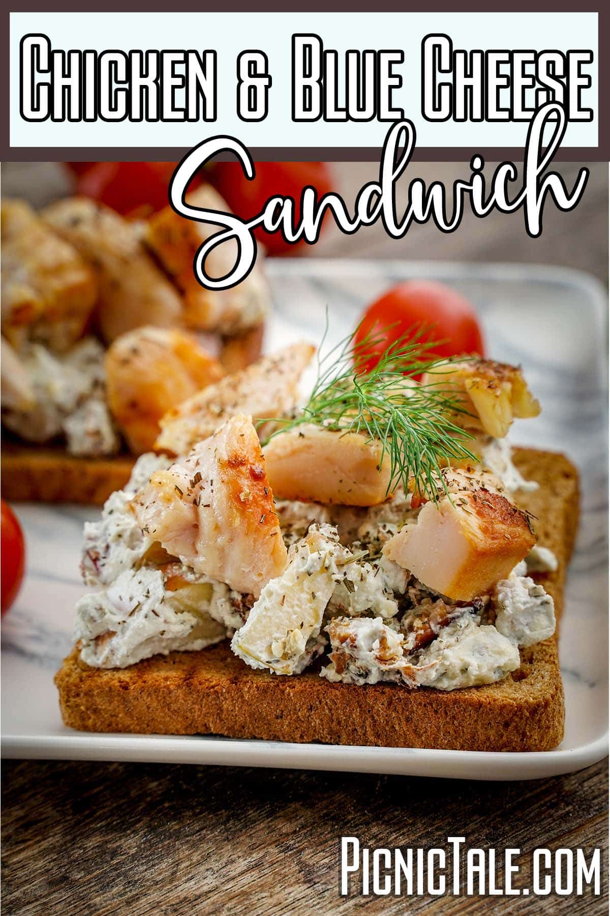 Chicken Blue Cheese and Walnut sandwiches on marble plate wording on top.