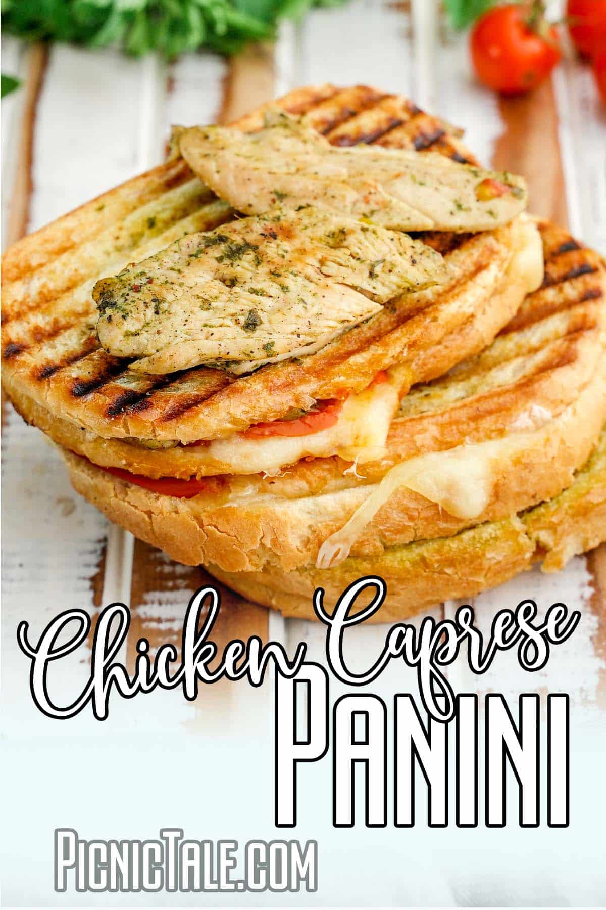 Chicken Caprese Panini, lettering on bottom. Chicken on top of sandwich.