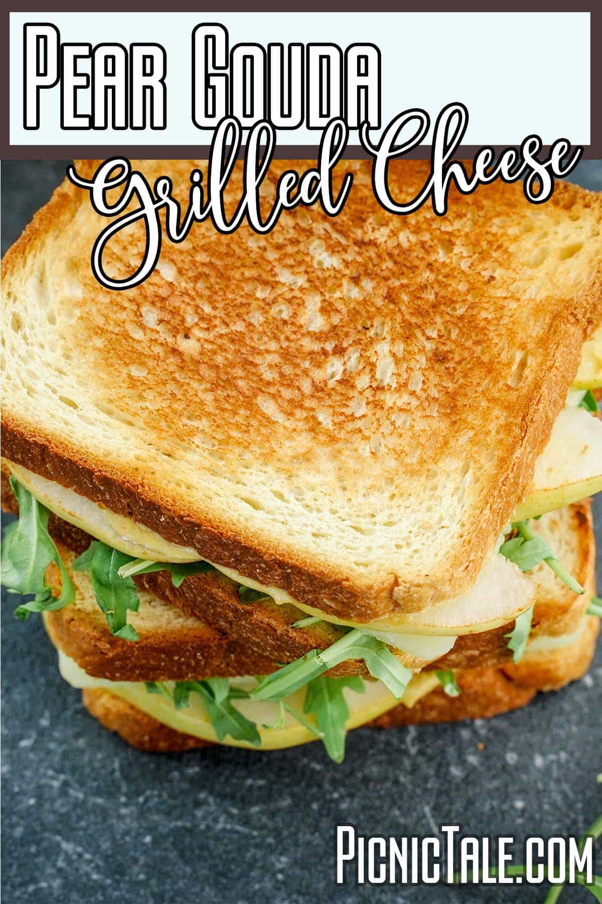 Pear Gouda Grilled Cheese, top view wording on top.