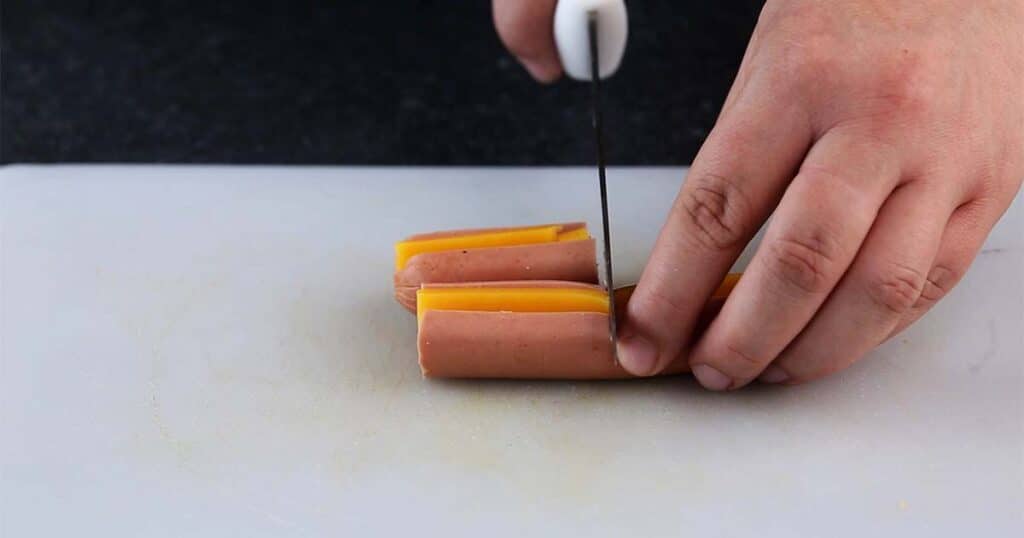 how to cut sausages to make Pigs in a Blanket