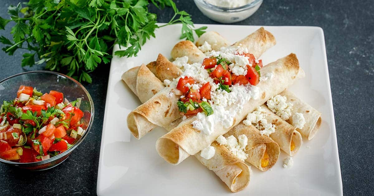 chicken taquitos on a plate