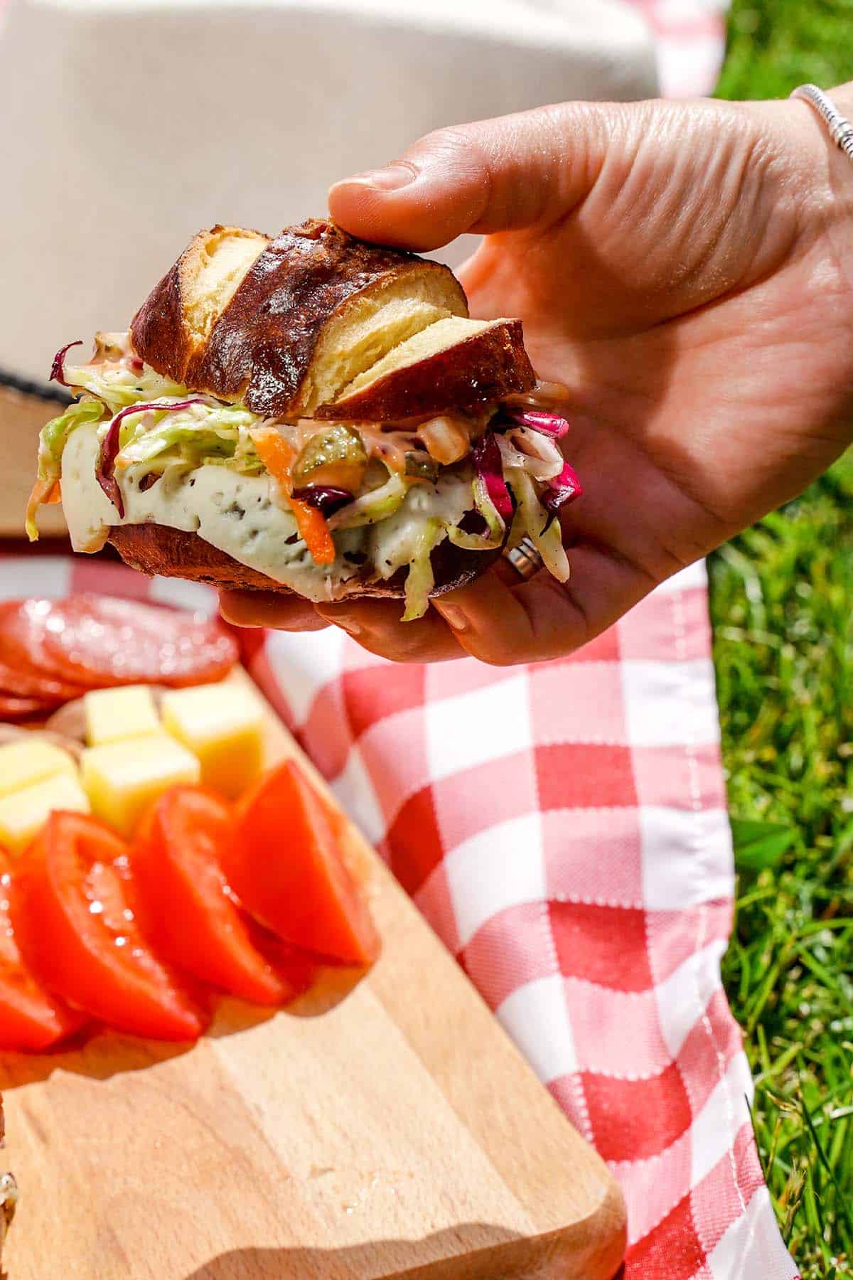 Coleslaw Swiss cheese melt, held at picnic outside.