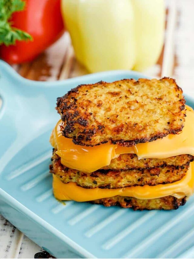 Cauliflower Cheese Sandwich, Stacked on blue platter.