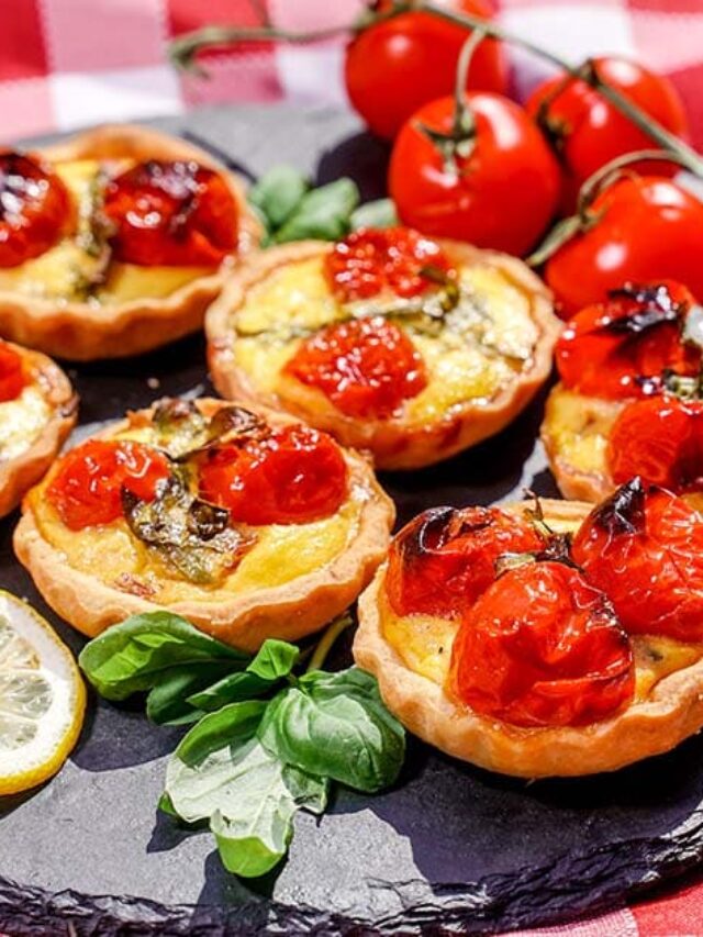 Roasted Tomato Pancetta Mini Quiches on a picnic spread