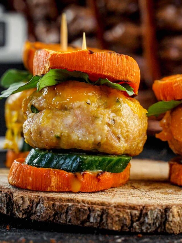 Turkey Sliders with Sweet Potato, focused on one stack on wood round.