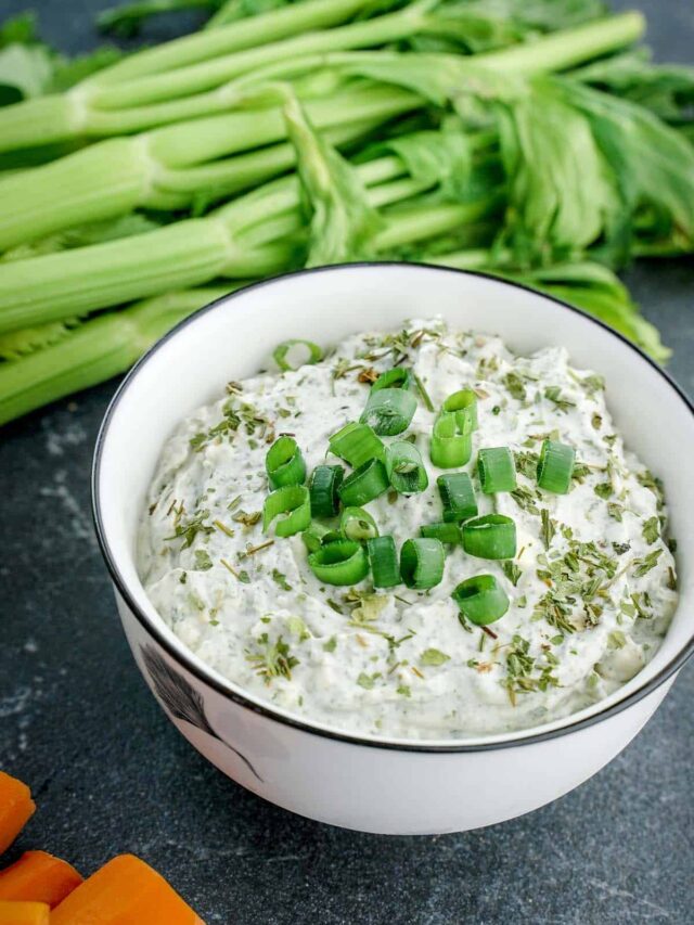 blue cheese dip in a bowl with celery