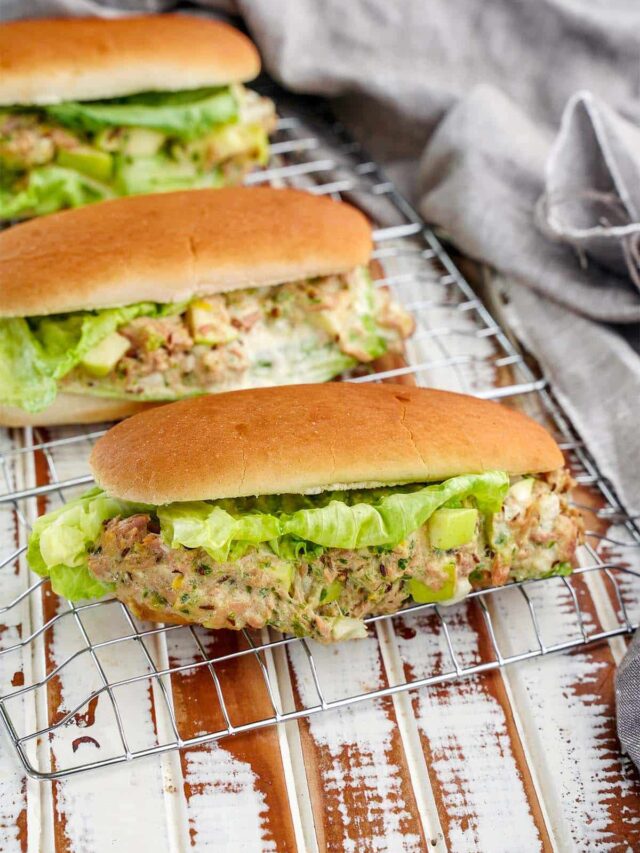 Garden tuna salad sandwich, whitewash board and wire rack.