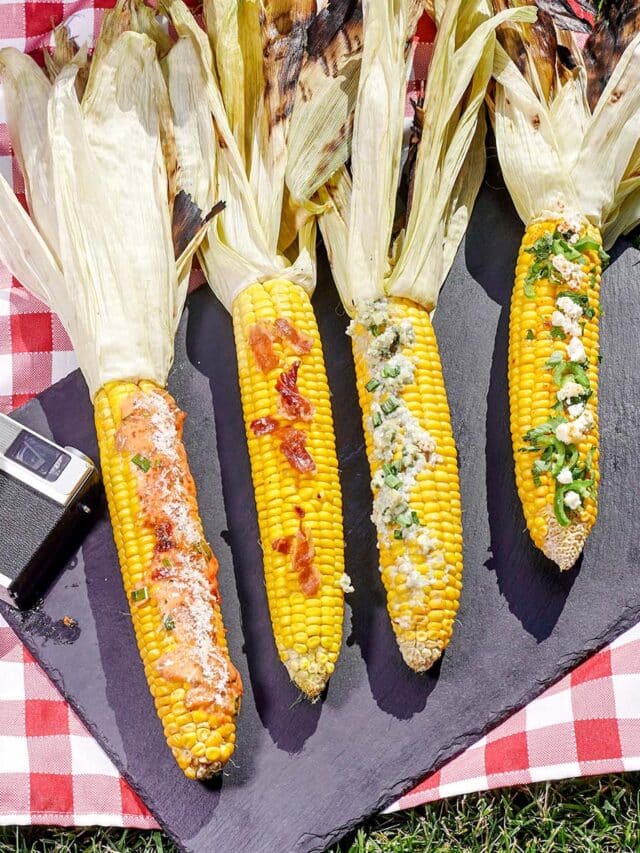 elote on a plate with text which reads grilled corn on the cob