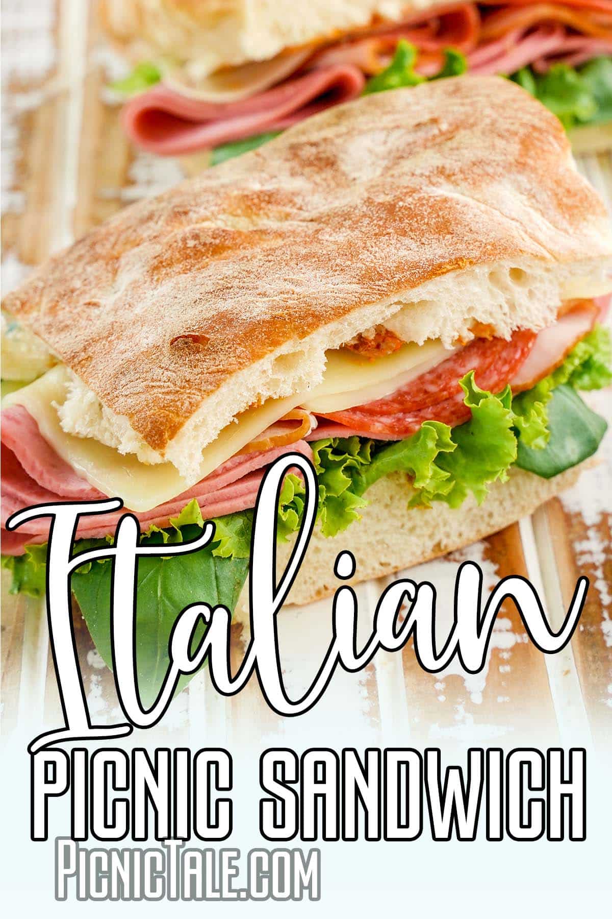 closeup of italian style sandwich with text which reads italian picnic sandwich