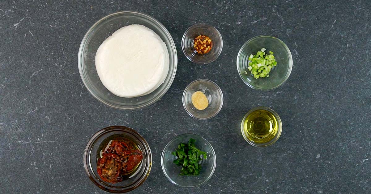 ingredients to make marinated mozzarella squares