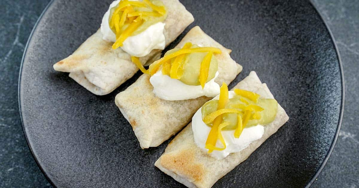 mini burritos on a plate