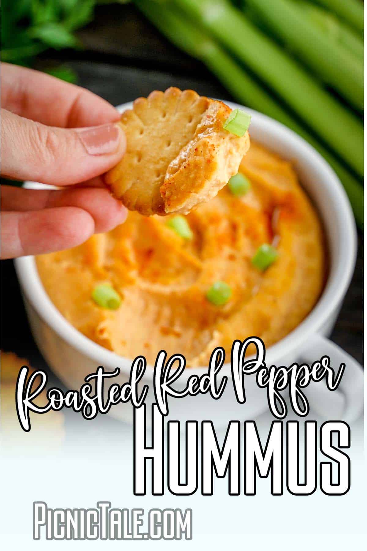 easy picnic side dish with text which reads roasted red pepper hummus