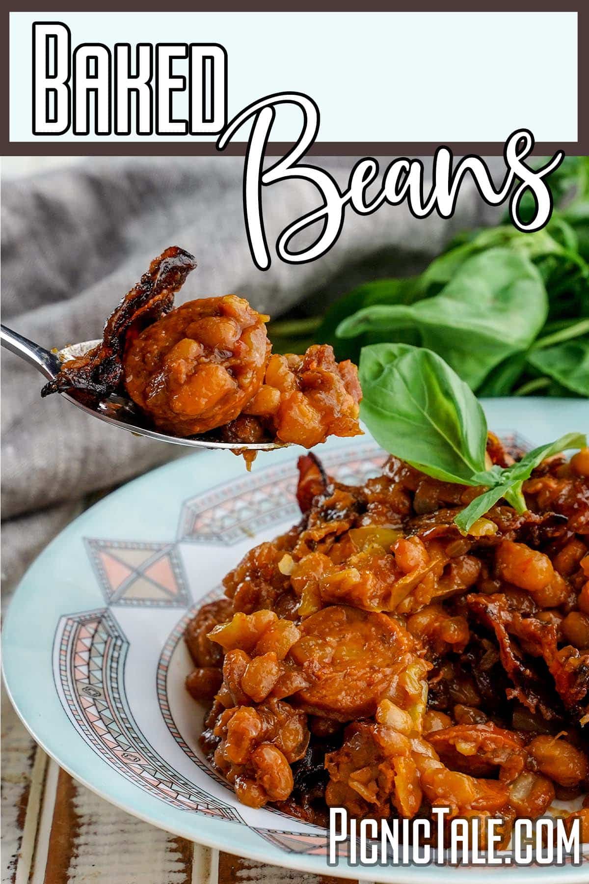 spoonful of Baked Beans with Sugar and Bacon with text which reads baked beans